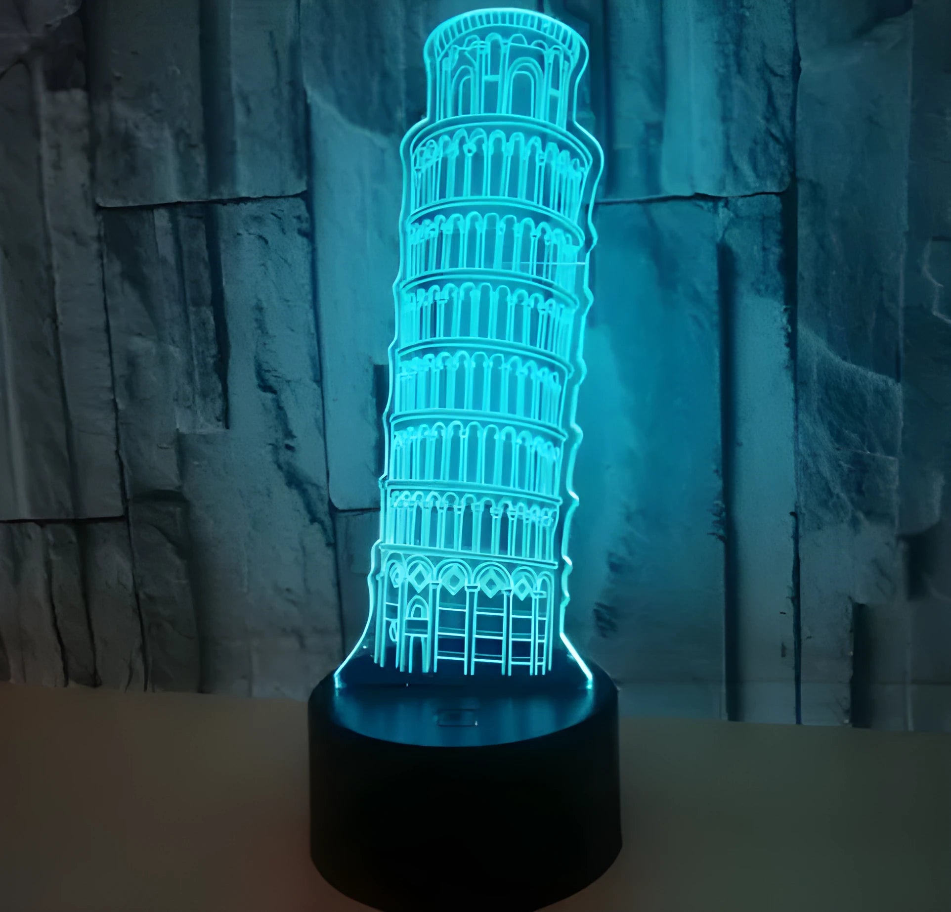 Leaning Tower of Pisa 3D acrylic night light glowing in blue on a black ABS base.