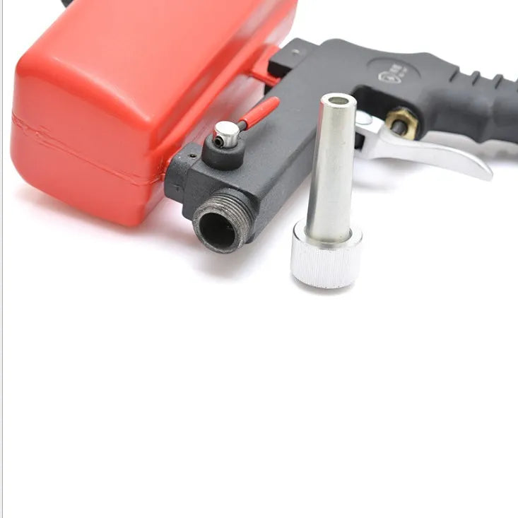 Portable black and blue pneumatic sandblasting gun with gravity-feed pot for rust removal and descaling.