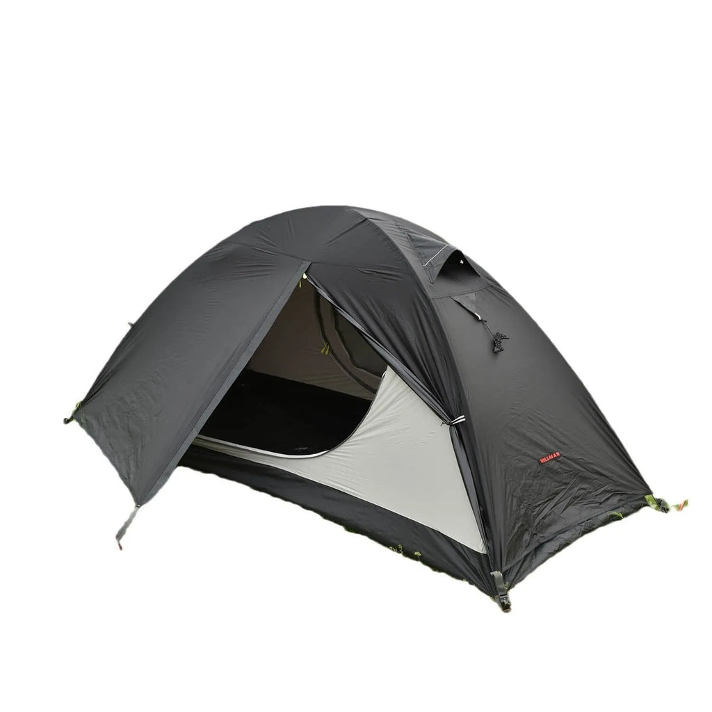 Single person hiking tent with aluminium poles pitched in outdoor setting showing red colour option