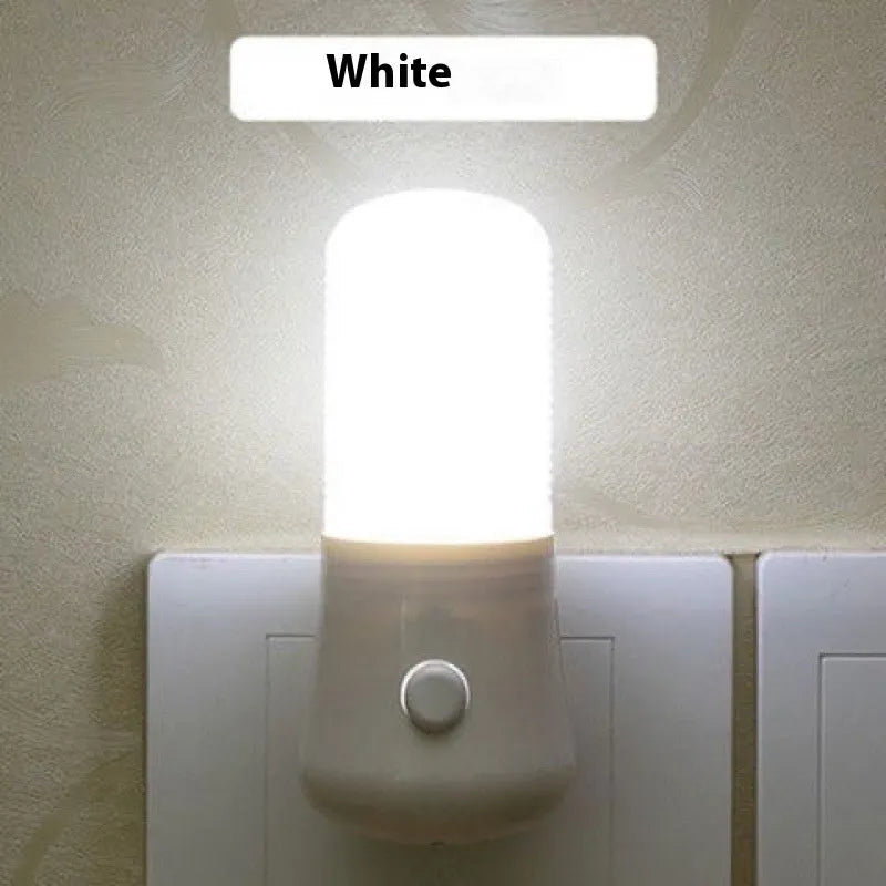 Minimalist cube bedside night light with US plug showing white and warm light switch