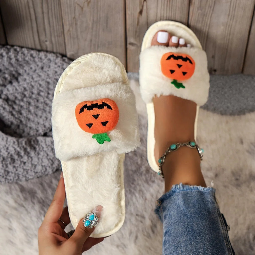 White and yellow pumpkin plush open toe slippers with cartoon Halloween design on synthetic fur