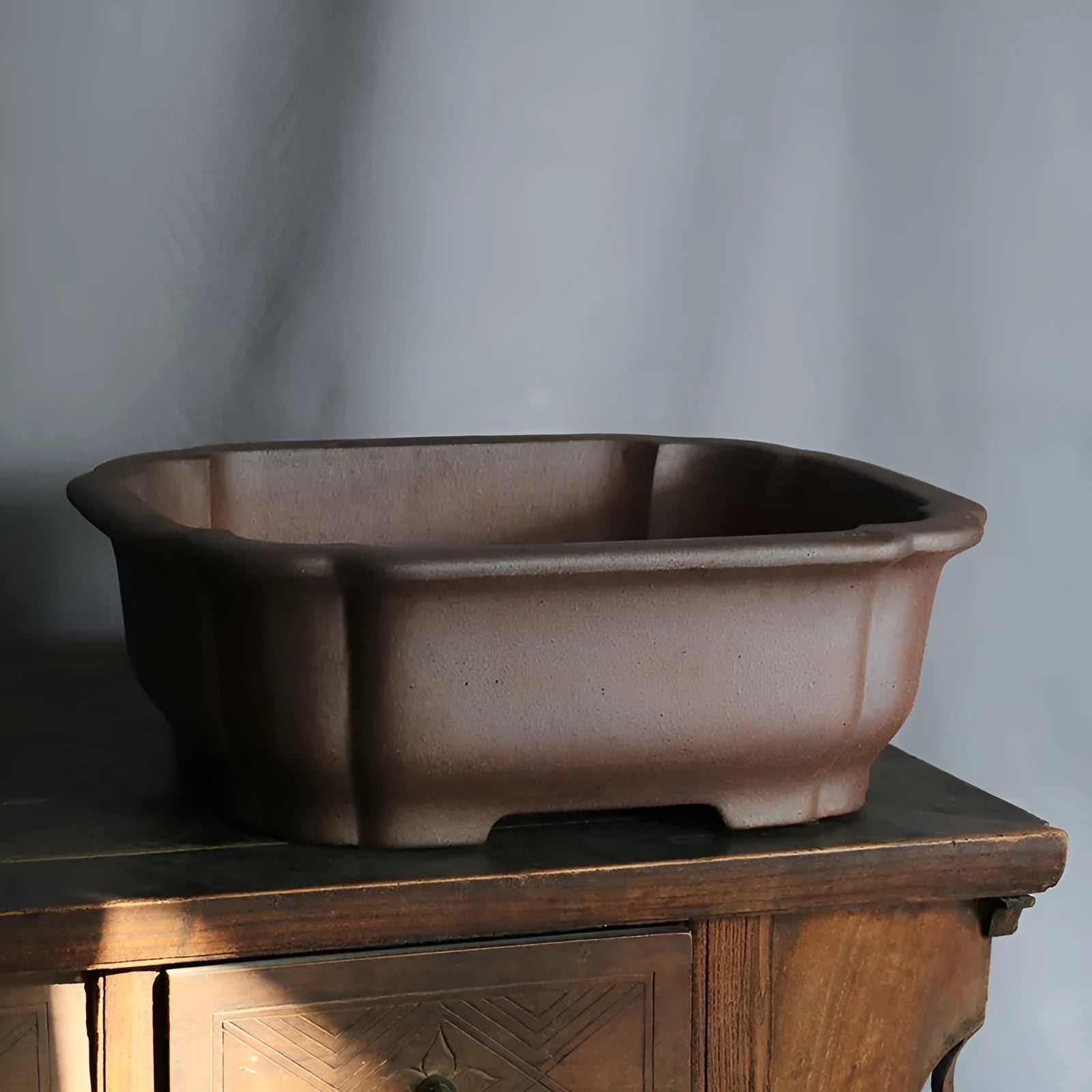 Purple sand rectangular bonsai flower pot with modern minimalist design on floor