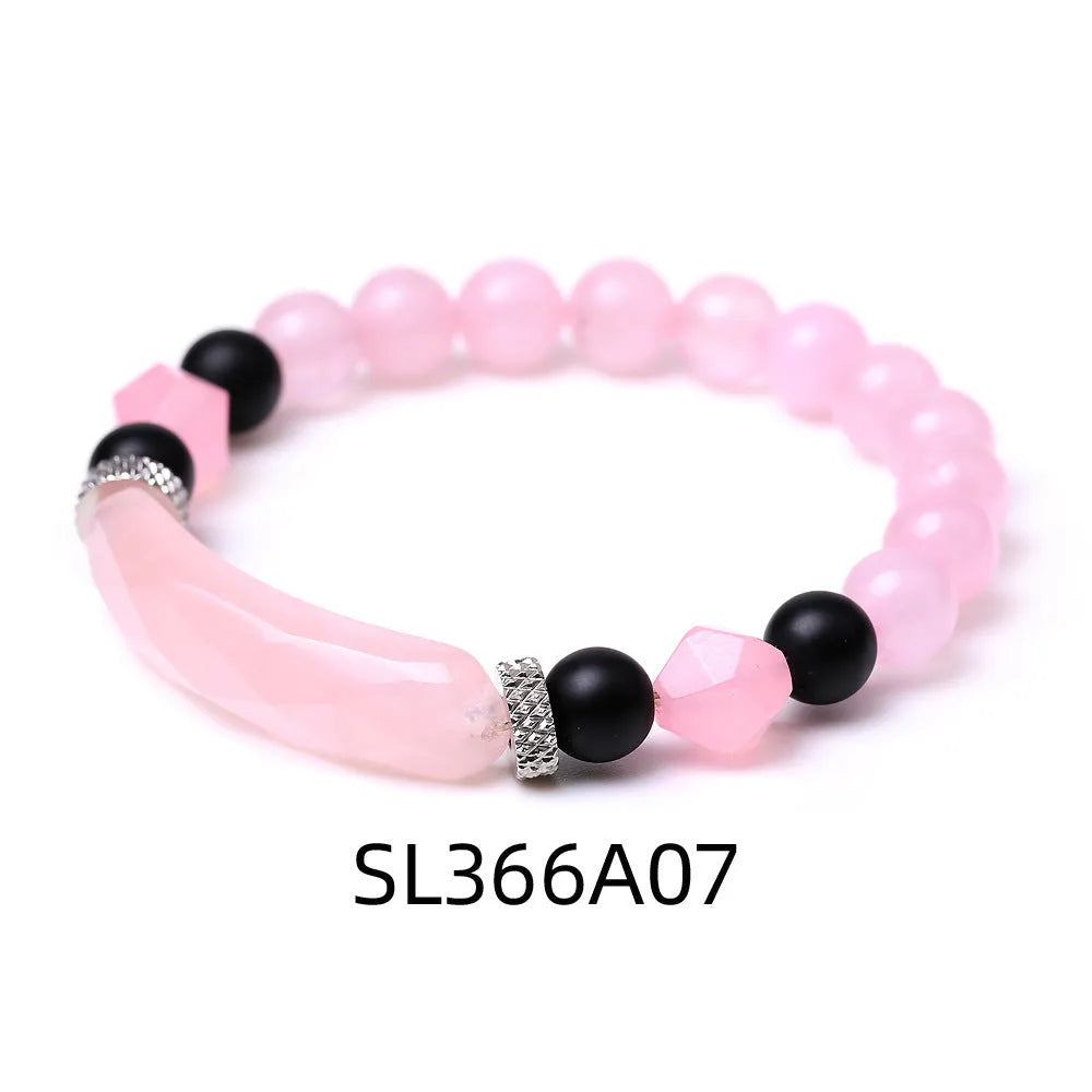 Diamond-shaped cut black agate bracelet showing geometric fan design and handmade craftsmanship