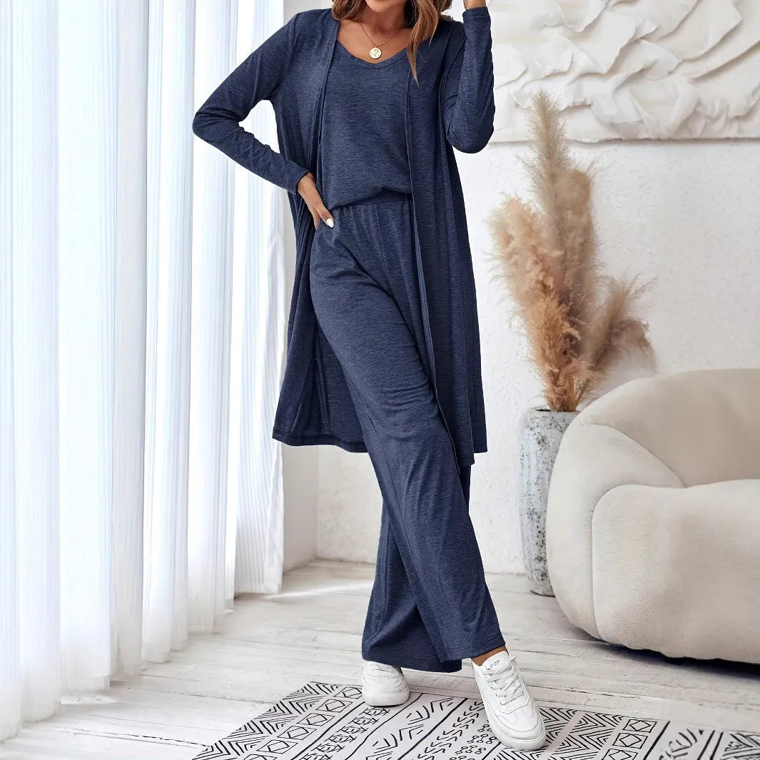 Blue women's three-piece co-ord set showing sling top, long cardigan, and trousers