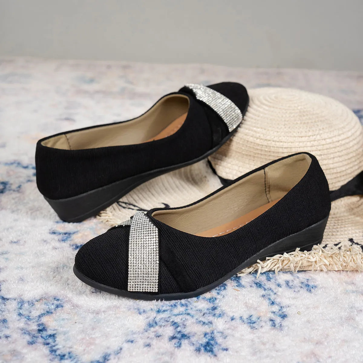 Black women's slip-on casual shoes with rhinestone detail and a chunky heel.