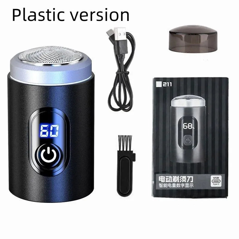 Black mini USB rechargeable shaver with cleaning brush and cable on white background