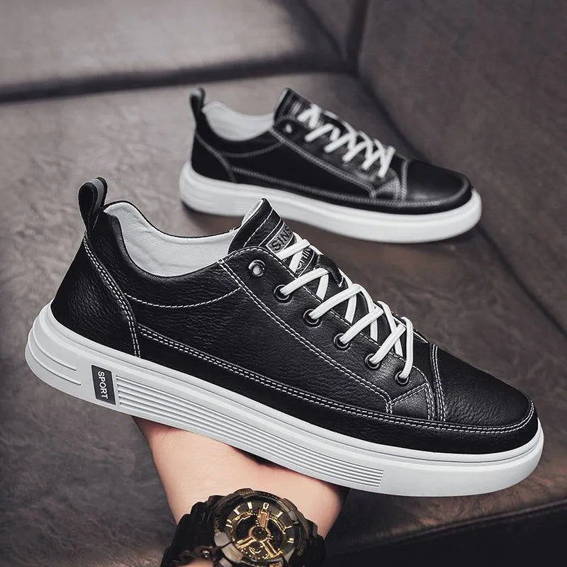 Men's white casual shoes with PU upper, flat sole, and round toe on a plain background.