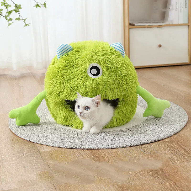 Fluffy round pet bed for cats and small dogs on a wooden floor