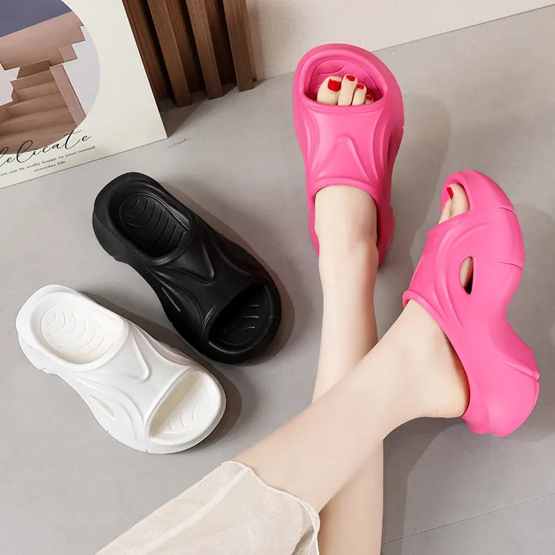 Women's EVA slippers with thick sole in black, rose red or white colours on beach background