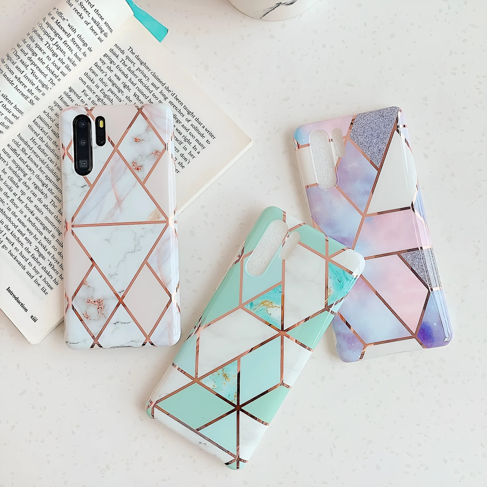 Electroplated marble pattern TPU phone case for Huawei and Samsung mobile phones in various colours.