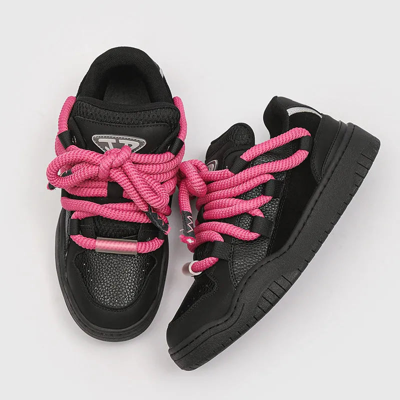 Unisex casual lace-up shoes with thick rubber soles in denim blue colour showing round toe and low-top design