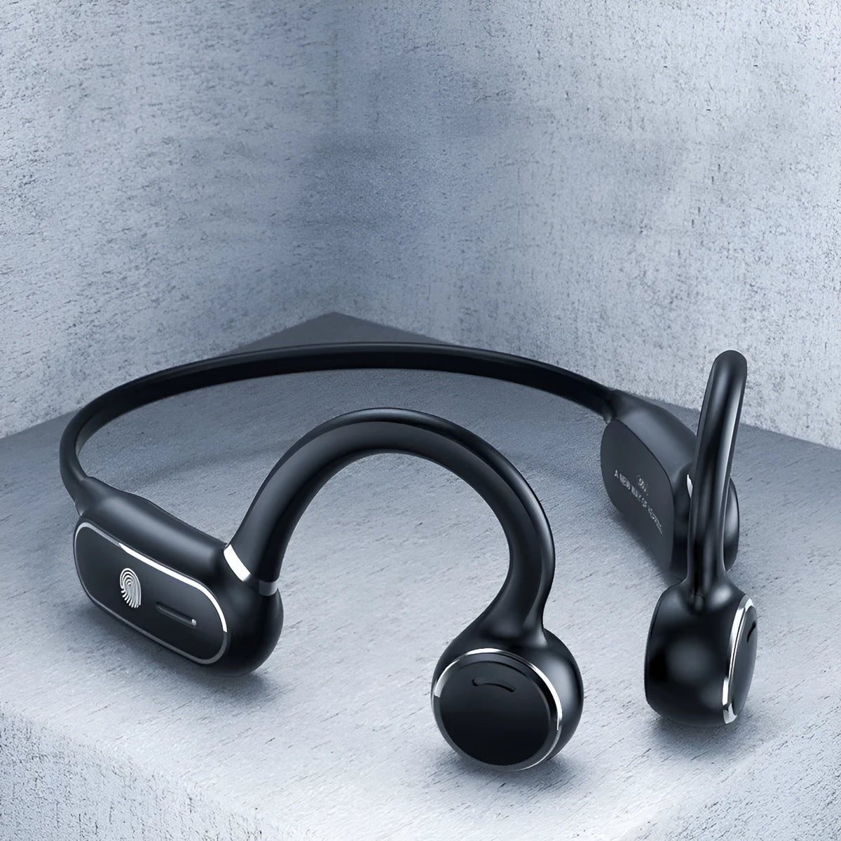 Black air conduction Bluetooth earphones with titanium alloy frame showing ear-hook design