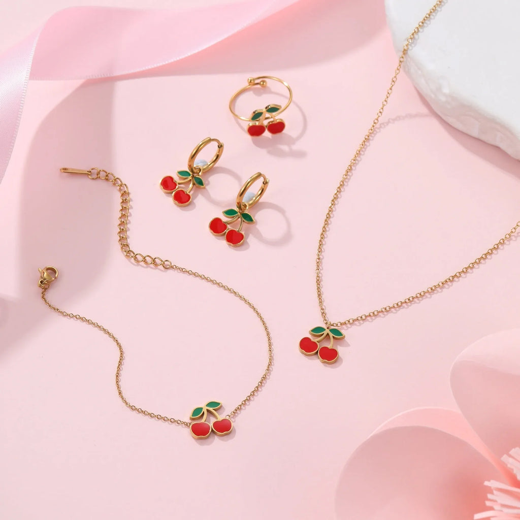 Cherry necklace, bracelet, earrings, and ring set in stainless steel with gold plating.