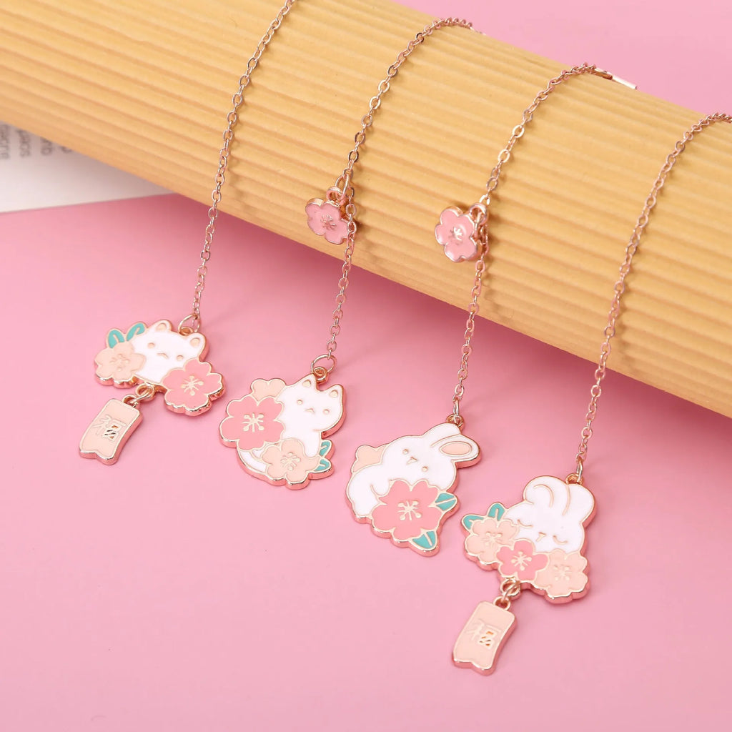 Metal pendant bookmark with cartoon sakura cat design for books and journals