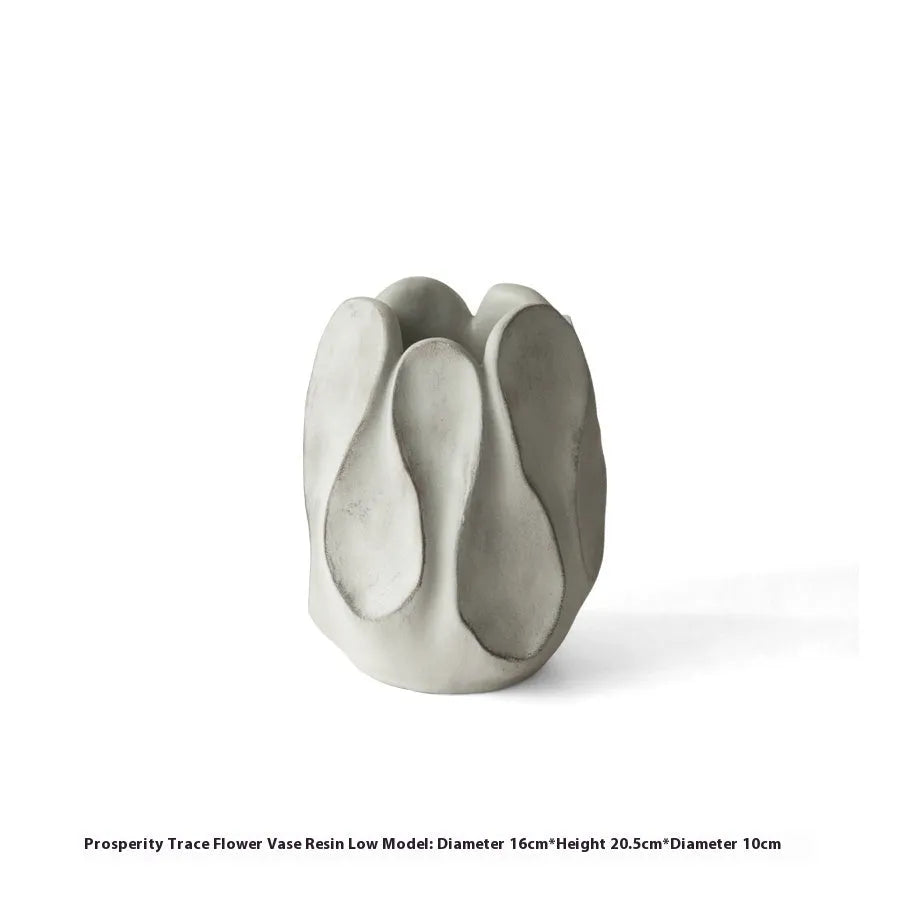 Irregular ceramic vase for flower arrangements in magnesium clay with natural textured finish