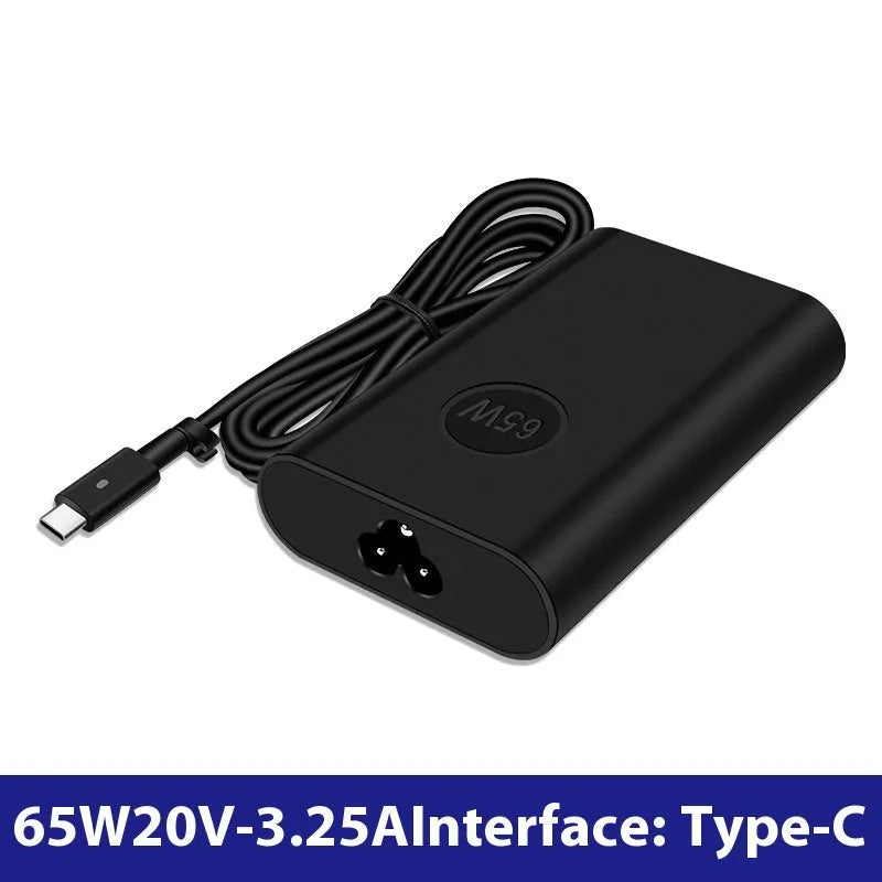 Black oval 65W USB-C laptop power adapter with UK plug, measuring 106mm long.