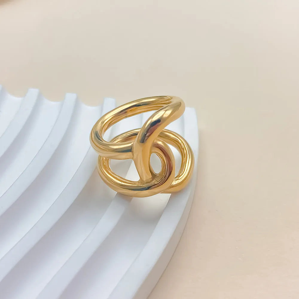 Women's adjustable stainless steel ring with knotted design and U-shaped geometric form