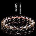Natural citrine scattered bead bracelet showing original design with polished beads in varying arrangements