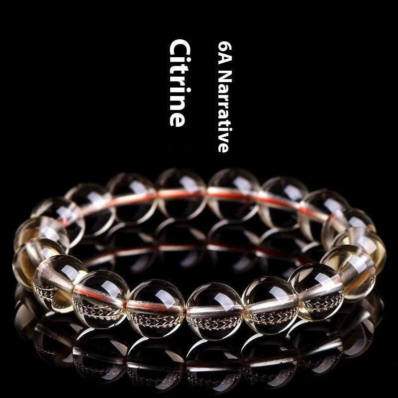 Natural citrine scattered bead bracelet showing original design with polished beads in varying arrangements
