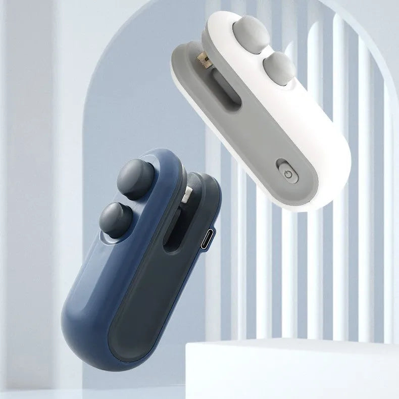 White handheld USB rechargeable heat sealing machine for chip bags with magnetic back and cutter