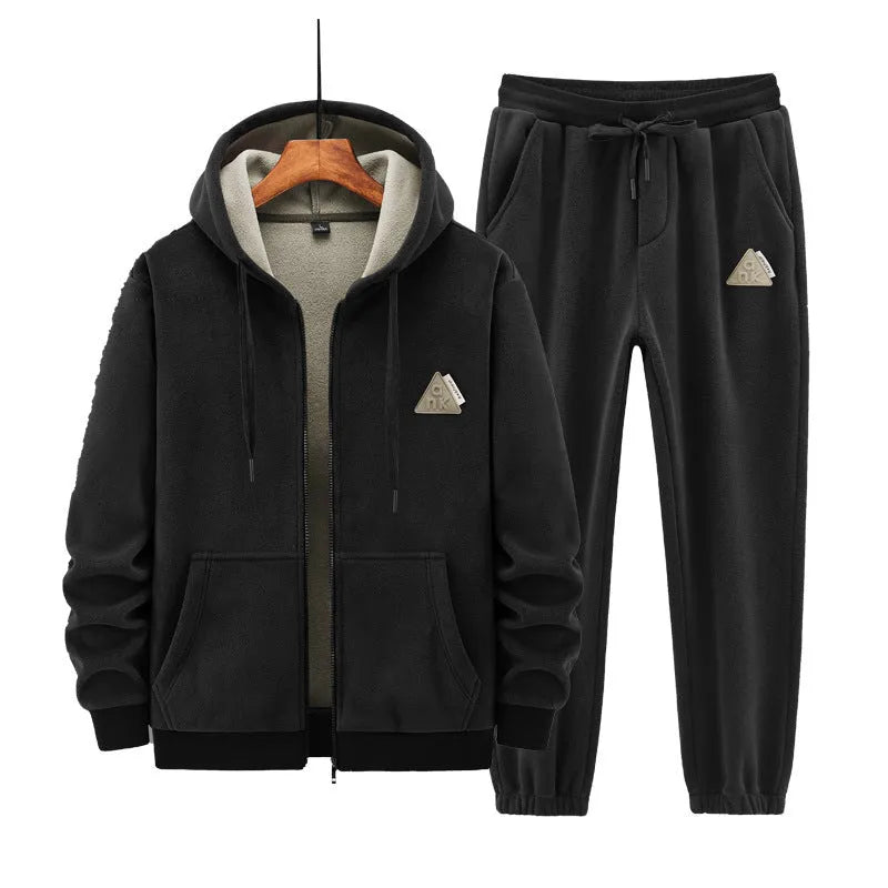 Casual sports suit consisting of a grey cashmere hooded sweater and matching cotton trousers.
