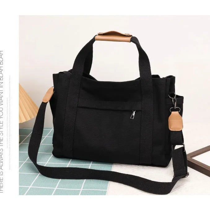 Large capacity canvas tote bag with internal organisation pockets and open on both sides zipper closure