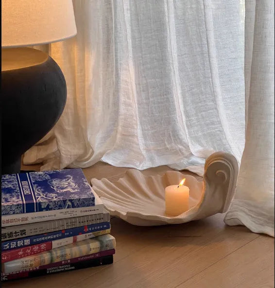 White resin simulation shell fruit plate decoration ornament on a table