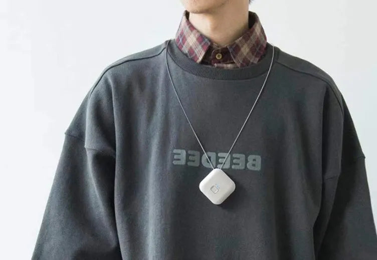 USB rechargeable wearable air purifier necklace in blue colour showing compact dimensions