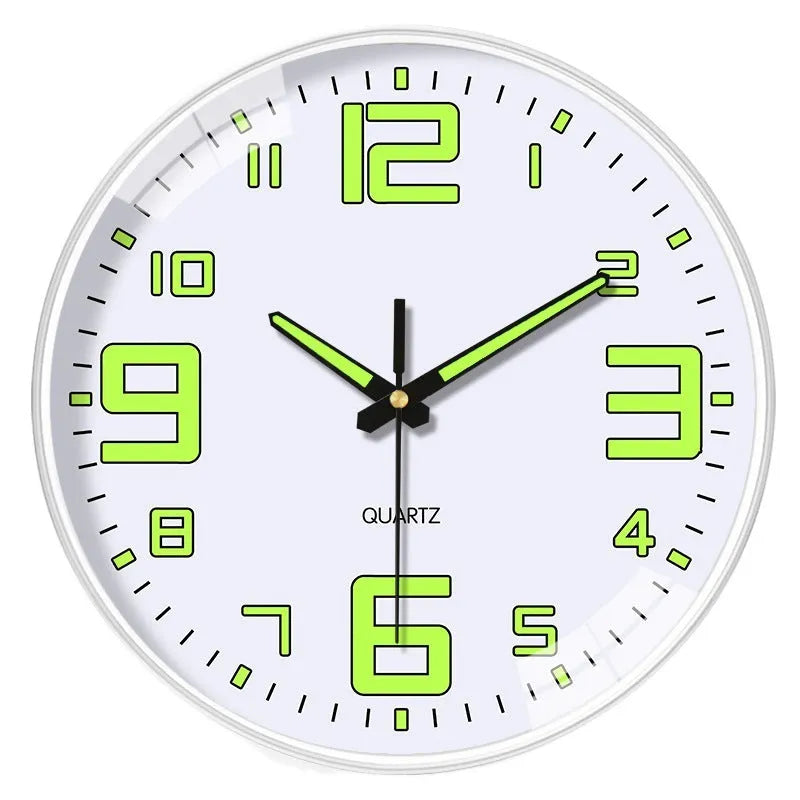 Modern 8-inch luminous wall clock with white plastic case on a wall.