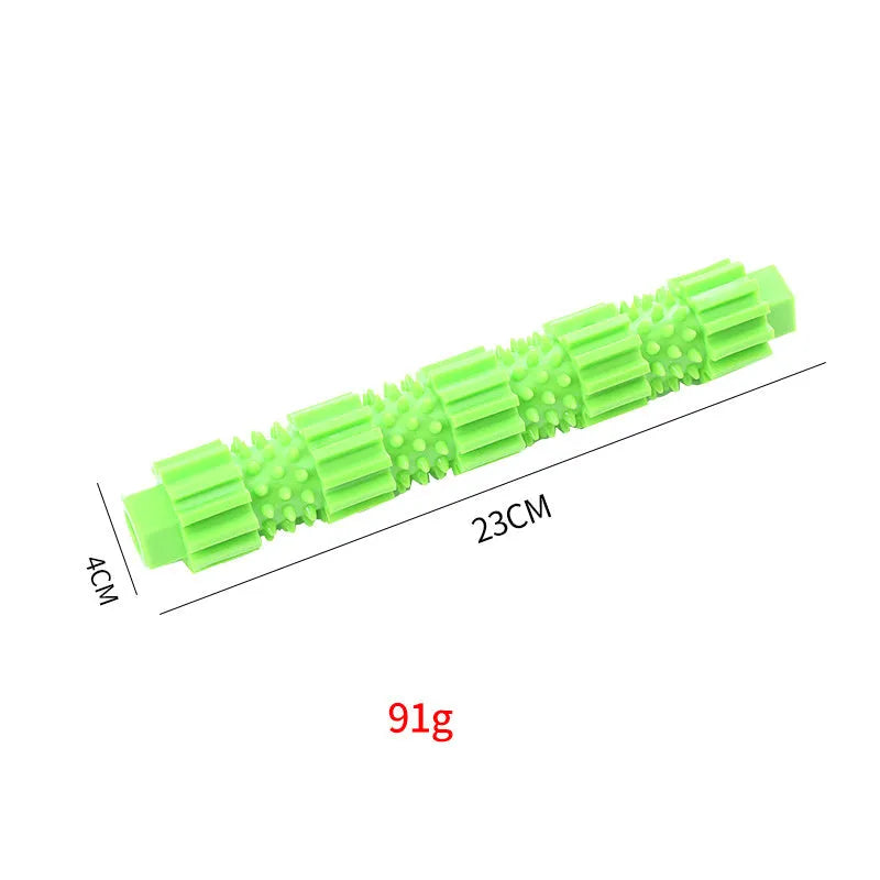 Green natural rubber dog chew toy with hollow centre for treat dispensing and teeth cleaning
