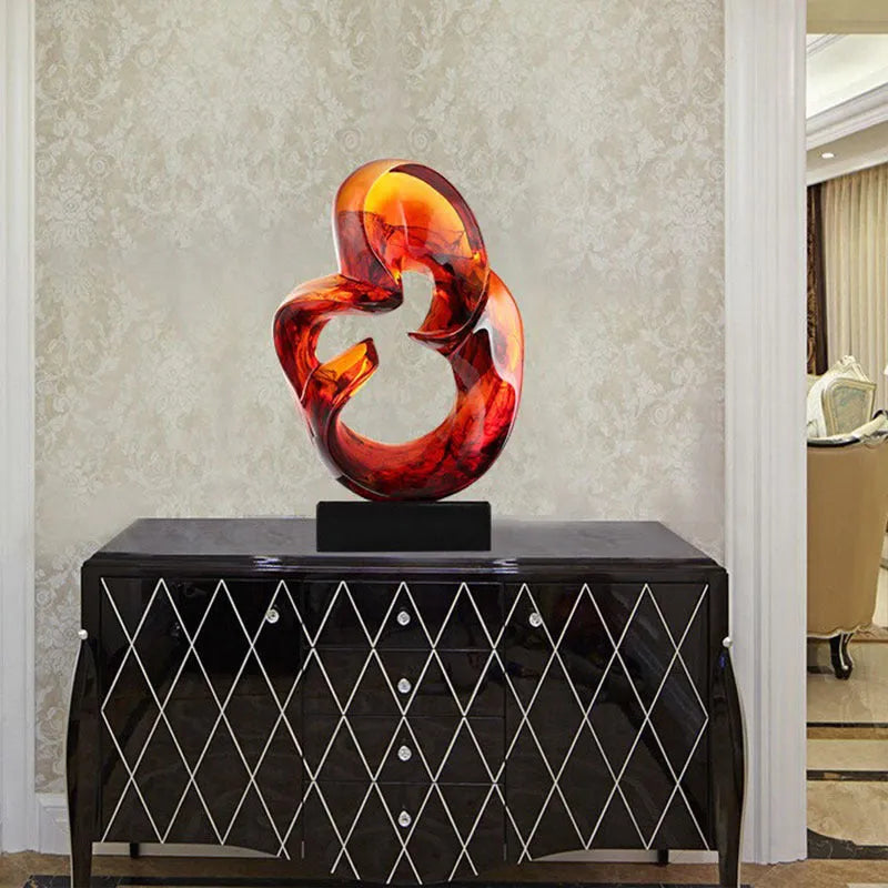 Transparent blue and orange red resin craft ornament sculpture with modern glass-like finish