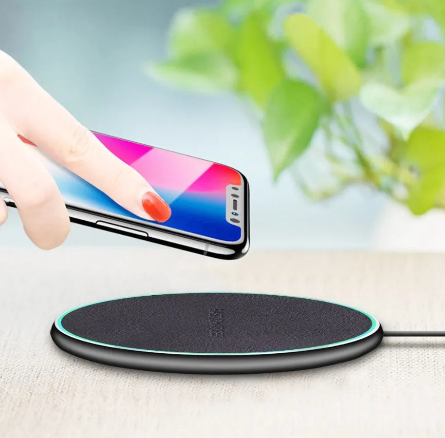Black Qi wireless charging pad for iPhone 11 with 7.5W fast charging