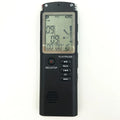 Black USB digital voice recorder for telephone and microphone recording, showing compact size