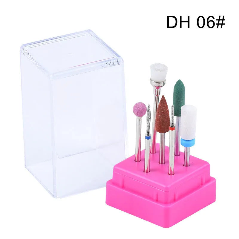 Tungsten steel nail drill polishing head set with six bits and a brush in a transparent case.