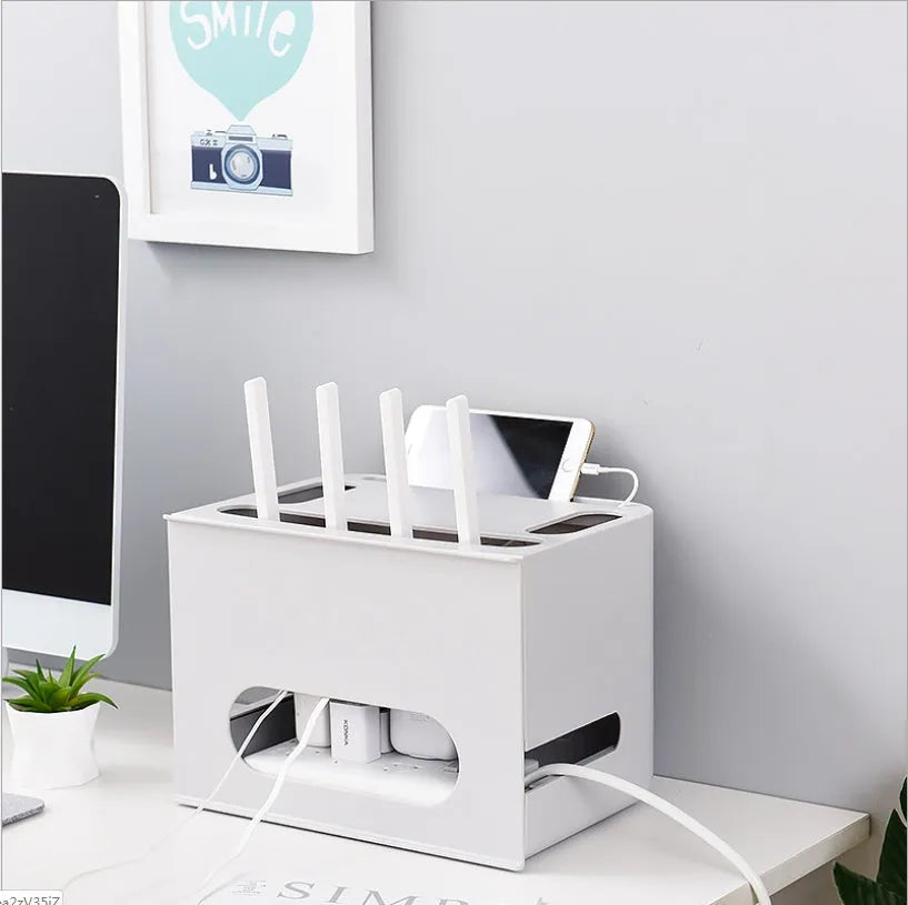 Plastic wireless router storage box in grey or white, wall-mountable cable organiser for home office