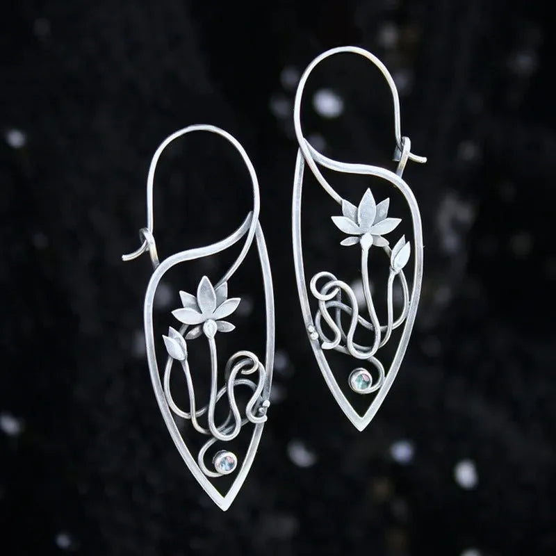 Silver lotus flower earrings with rhinestones on geometric alloy setting