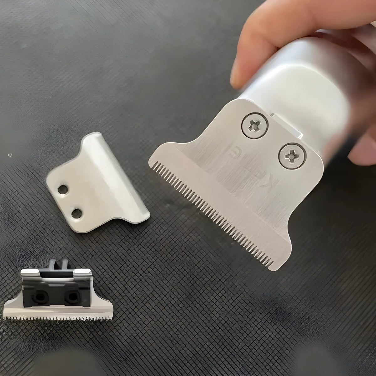 Barber scissors with LCD display showing battery level and stainless steel cutting heads