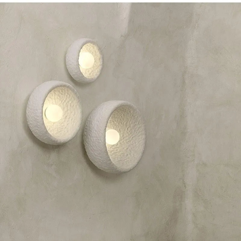 Japanese minimalist wall lamp with resin shade in three size options for ambient lighting