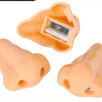 Flesh coloured plastic manual pencil sharpener with a geometry shape and large nostril opening.