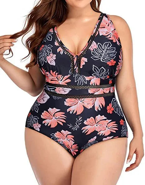Black printed plus size women's bikini swimsuit on a hanger.