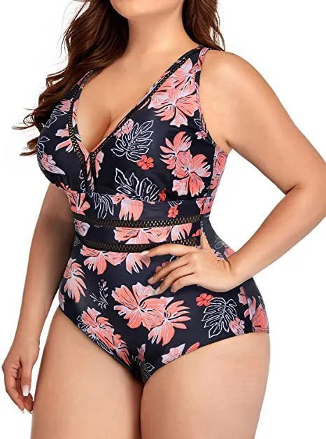 Black printed plus size women's bikini swimsuit on a hanger.