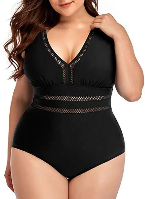 Black printed plus size women's bikini swimsuit on a hanger.