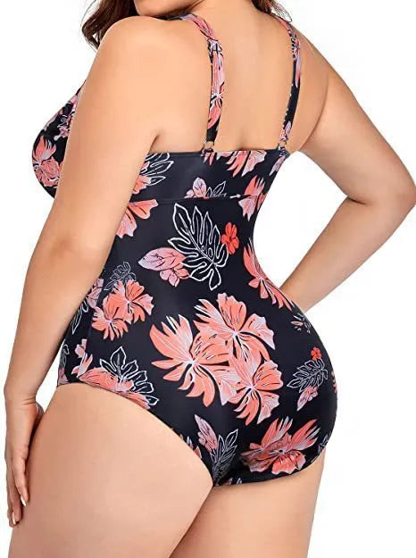 Black printed plus size women's bikini swimsuit on a hanger.