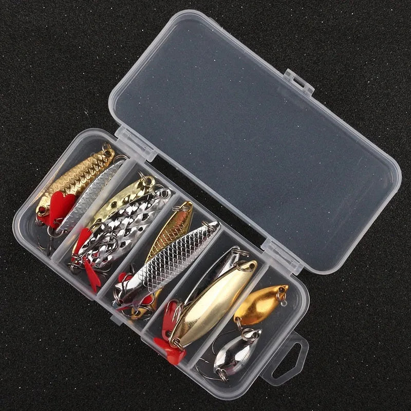 Box of gold and silver metal sequin false bait bodies for fishing lure repair and customisation.