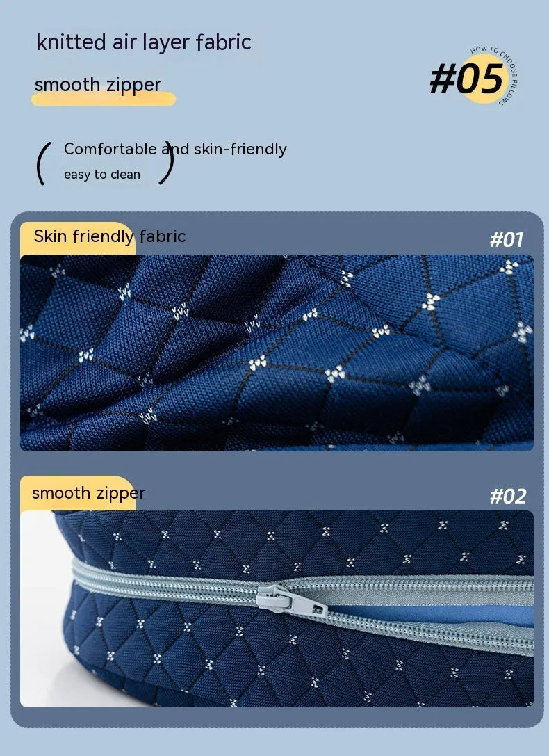 Heart-shaped dark blue memory foam leg pillow for adults on a bed.
