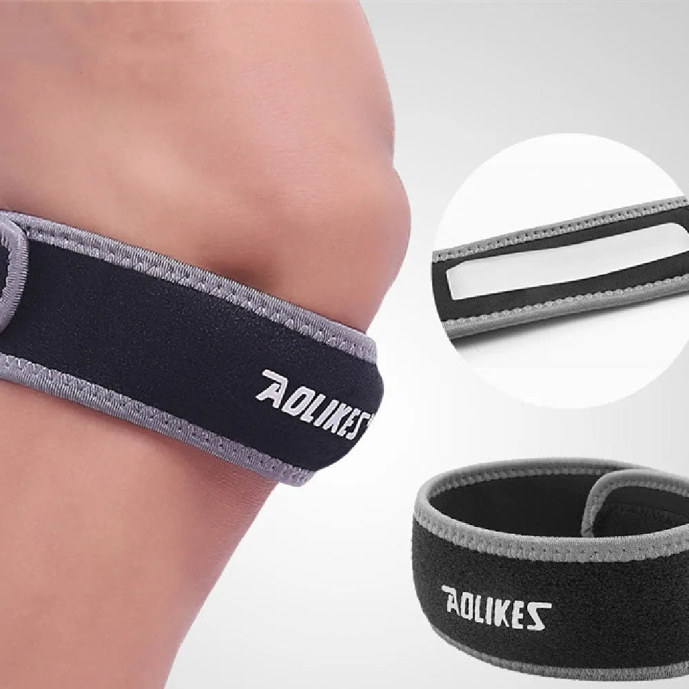 Black and grey patella retinaculum knee support for sports