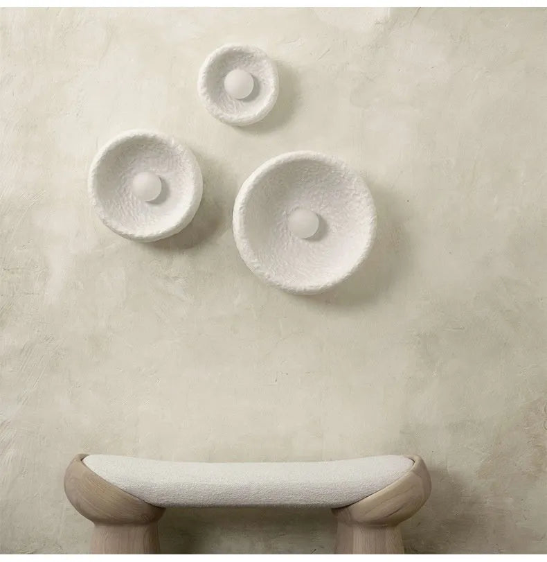 Japanese minimalist wall lamp with resin shade in three size options for ambient lighting
