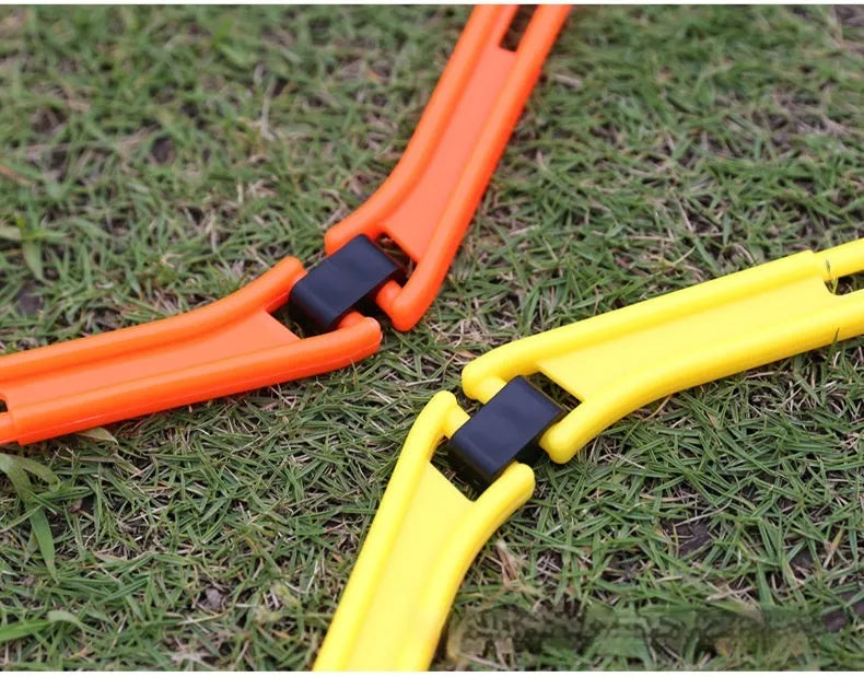 Set of six foldable hexagon football agility training rings in yellow, green and orange colours