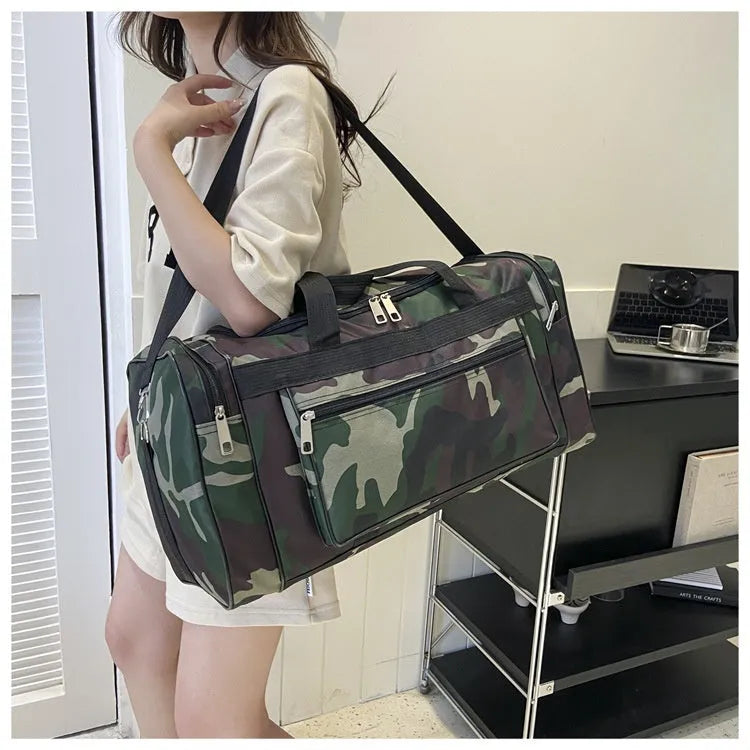 Green camouflage waterproof fabric luggage bag with striped interior lining.