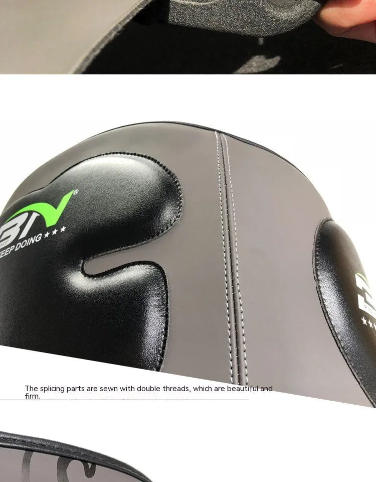 Dark gray Sanda boxing breast protection target with integrated waist guard for martial arts training.